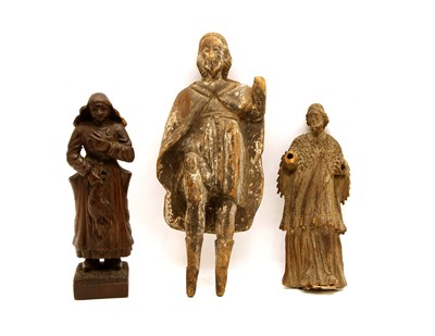 Lot 137 - A carved wooden figure of a saint