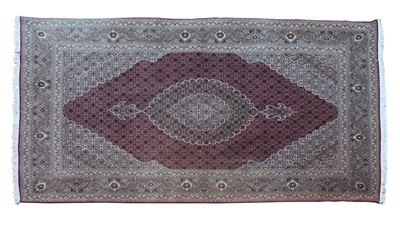 Lot 870A - A Persian wool rug