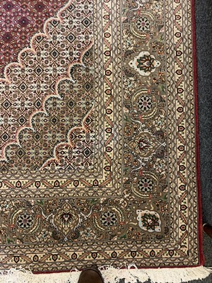 Lot 870 - A Persian wool rug