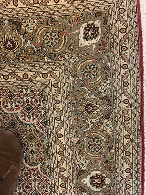 Lot 870 - A Persian wool rug