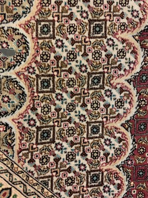 Lot 870 - A Persian wool rug