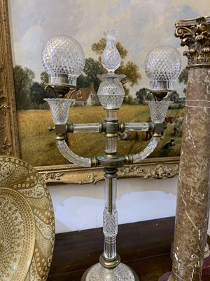 Lot 388 - A pair of cut glass and gilt brass electric lamps