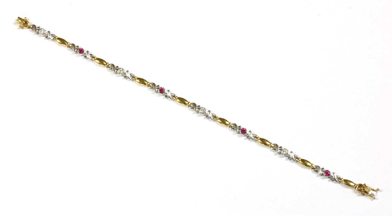 Lot 42 - A two colour gold ruby and diamond bracelet
