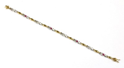 Lot 42 - A two colour gold ruby and diamond bracelet