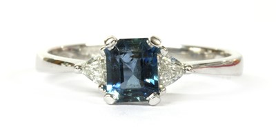 Lot 130 - An 18ct white gold aquamarine and diamond three stone ring