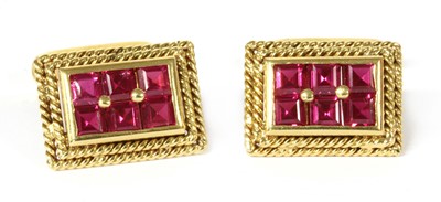 Lot 402 - A pair of gold synthetic ruby cufflinks