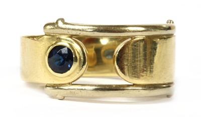 Lot 245 - A gold single stone sapphire ring