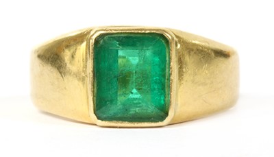 Lot 238 - A gold single stone emerald ring