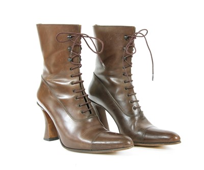Lot 125 - A pair of Michel Perry brown leather ankle boots