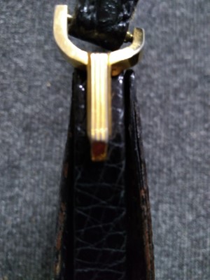 Lot 72 - A vintage black crocodile leather handbag