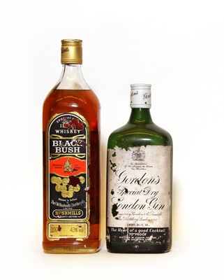 Lot 204 - Assorted spirits; Gordons, 1970s bottling and Black Bush, 1980s bottling, two bottles in total