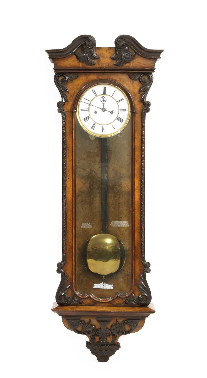 Lot 445 - A walnut Vienna wall clock