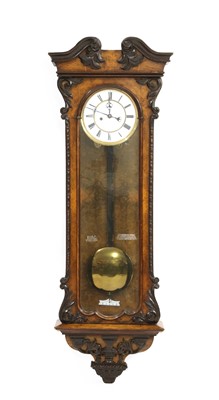 Lot 445 - A walnut Vienna wall clock