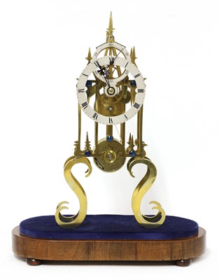 Lot 85 - A Victorian brass single fusee skeleton clock
