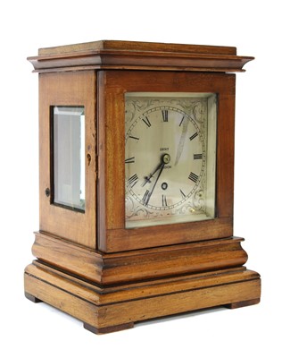 Lot 124 - A mahogany library timepiece