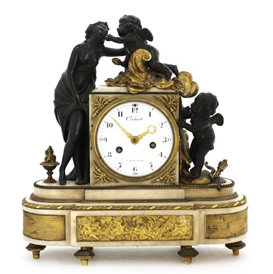 Lot 966 - A French bronze and marble mantel clock