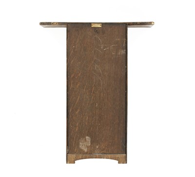 Lot 435 - An oak wall-mounted cabinet by Liberty & Co.