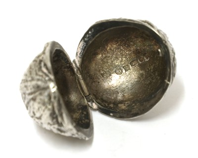 Lot 51 - A silver box in the form of a walnut