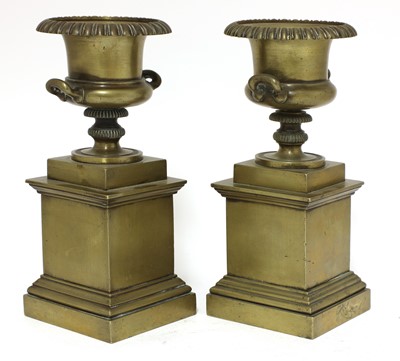 Lot 845 - A pair of bronze urns