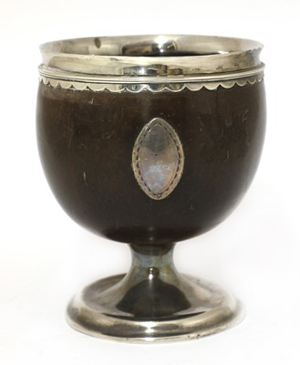 Lot 25 - A silver-mounted coconut cup