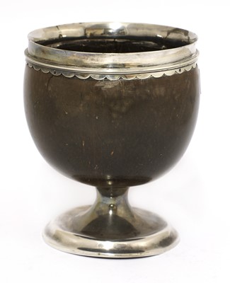 Lot 25 - A silver-mounted coconut cup