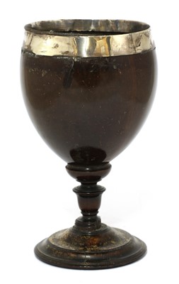 Lot 26 - A George IV silver-mounted coconut cup
