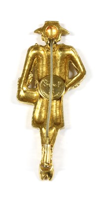 Lot 184 - A Chanel gold-plated 'Madame Coco' brooch