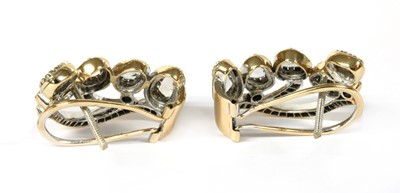 Lot 59 - A pair of gold lasque cut diamond spray earrings