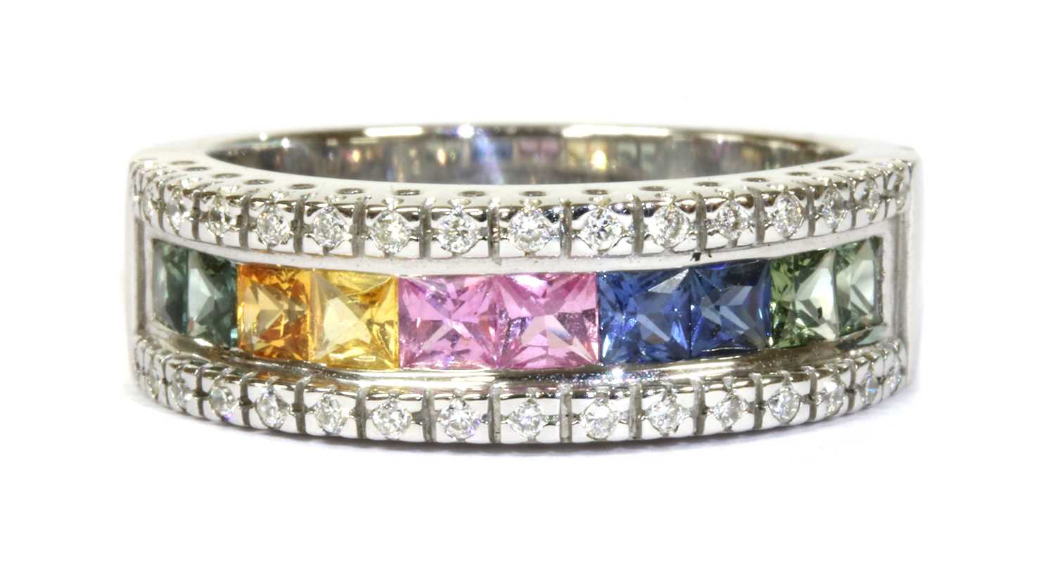 Lot 218 - An 18ct white gold rainbow sapphire and diamond ring