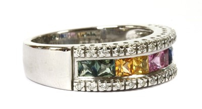 Lot 218 - An 18ct white gold rainbow sapphire and diamond ring