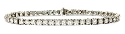 Lot 96 - An 18ct white gold diamond line bracelet