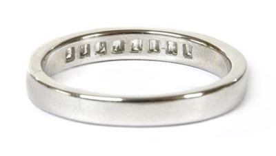 Lot 99 - A white gold diamond half eternity ring