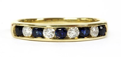 Lot 107 - A gold sapphire and diamond half eternity ring