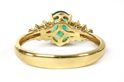 Lot 162 - A gold emerald and diamond ring