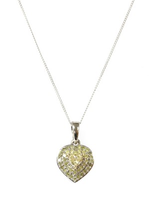 Lot 341 - A white gold heart shaped yellow diamond pendant