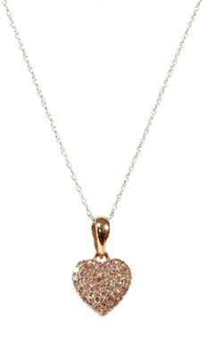 Lot 86 - A rose gold heart-shaped pink diamond pendant