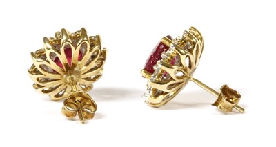 Lot 40 - A pair of gold ruby and diamond cluster earrings