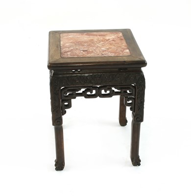 Lot 743 - A Chinese hardwood jardiniere stand