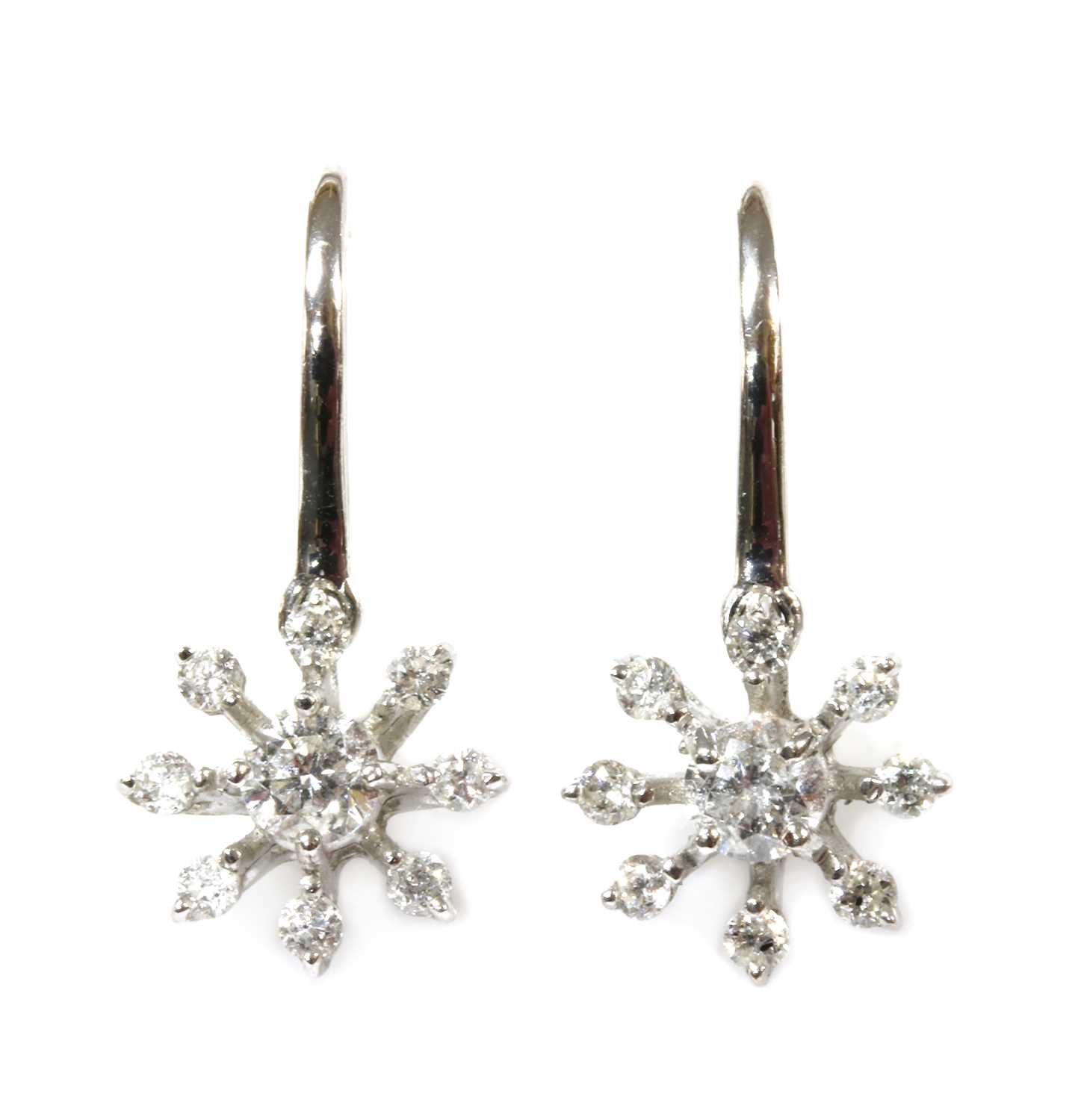Lot 94 - A pair of white gold diamond cluster earrings