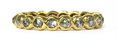 Lot 9 - A gold diamond full eternity ring