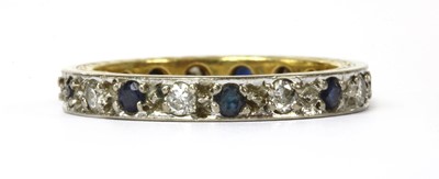 Lot 108 - A gold and white gold, sapphire and diamond full eternity ring
