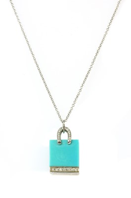 Lot 133 - A platinum turquoise and diamond shopping bag pendant/charm by Tiffany & Co.