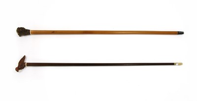 Lot 499 - A reproduction walking stick