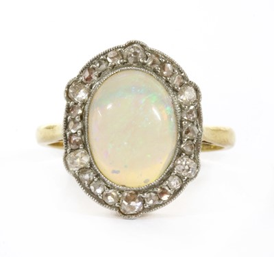 Lot 15 - A gold opal and diamond ring