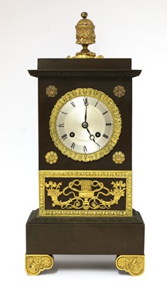 Lot 930 - A French bronze table clock