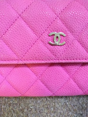 Lot 91 - A Chanel pink Continental wallet