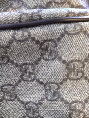 Lot 35 - A Gucci beige coated canvas shoulder bag
