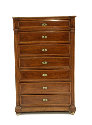 Lot 615 - A mahogany and walnut seven drawer chest