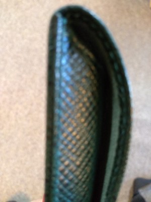 Lot 148 - A Louis Vuitton green taiga leather pen case
