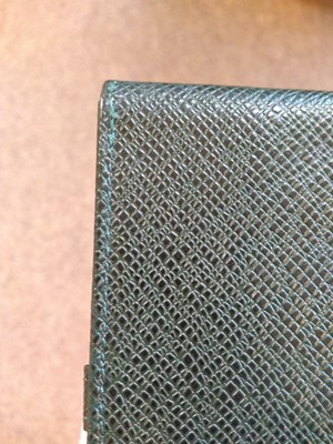 Lot 148 - A Louis Vuitton green taiga leather pen case